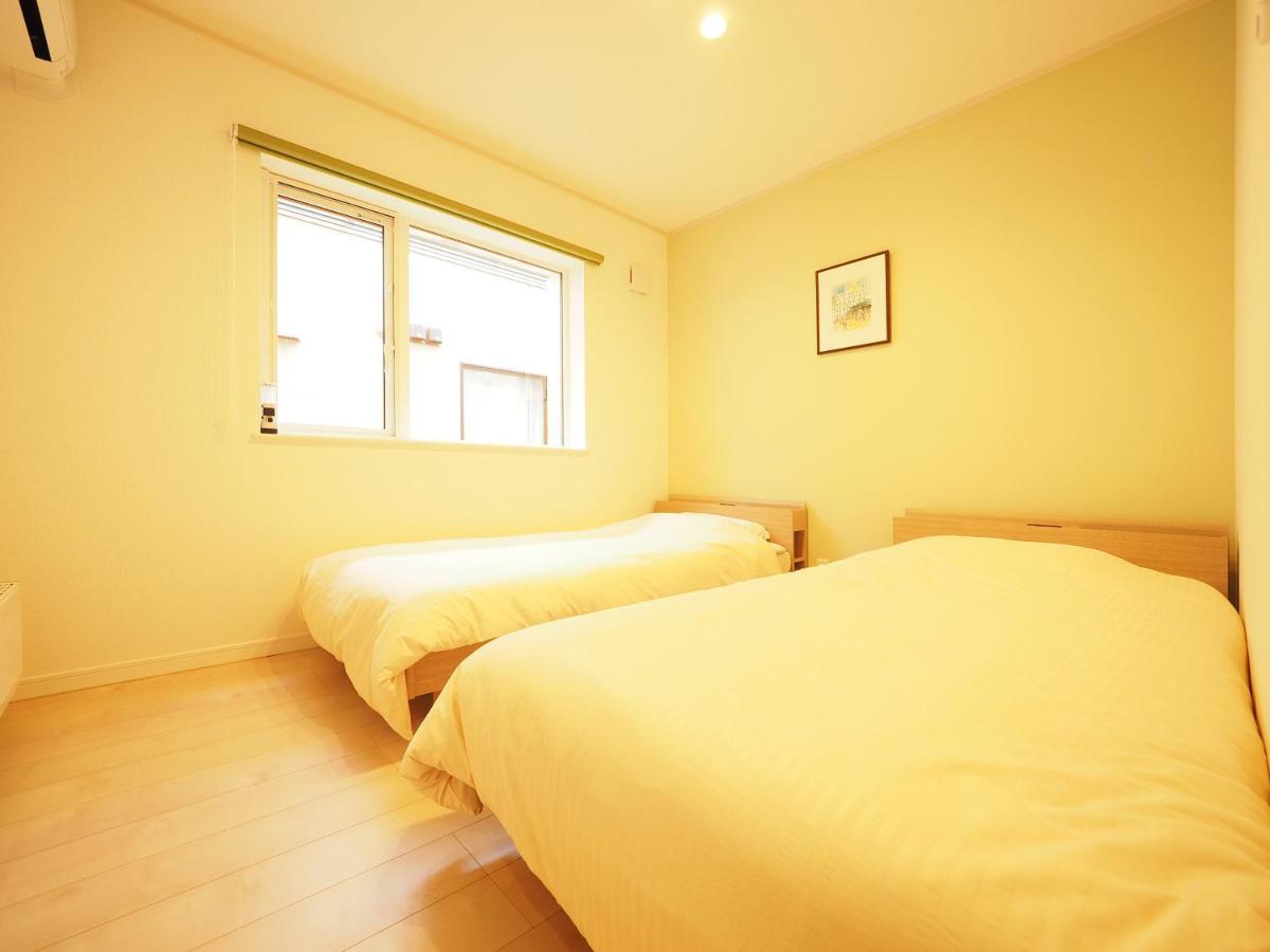 Family Tree Guest House Sapporo Esterno foto