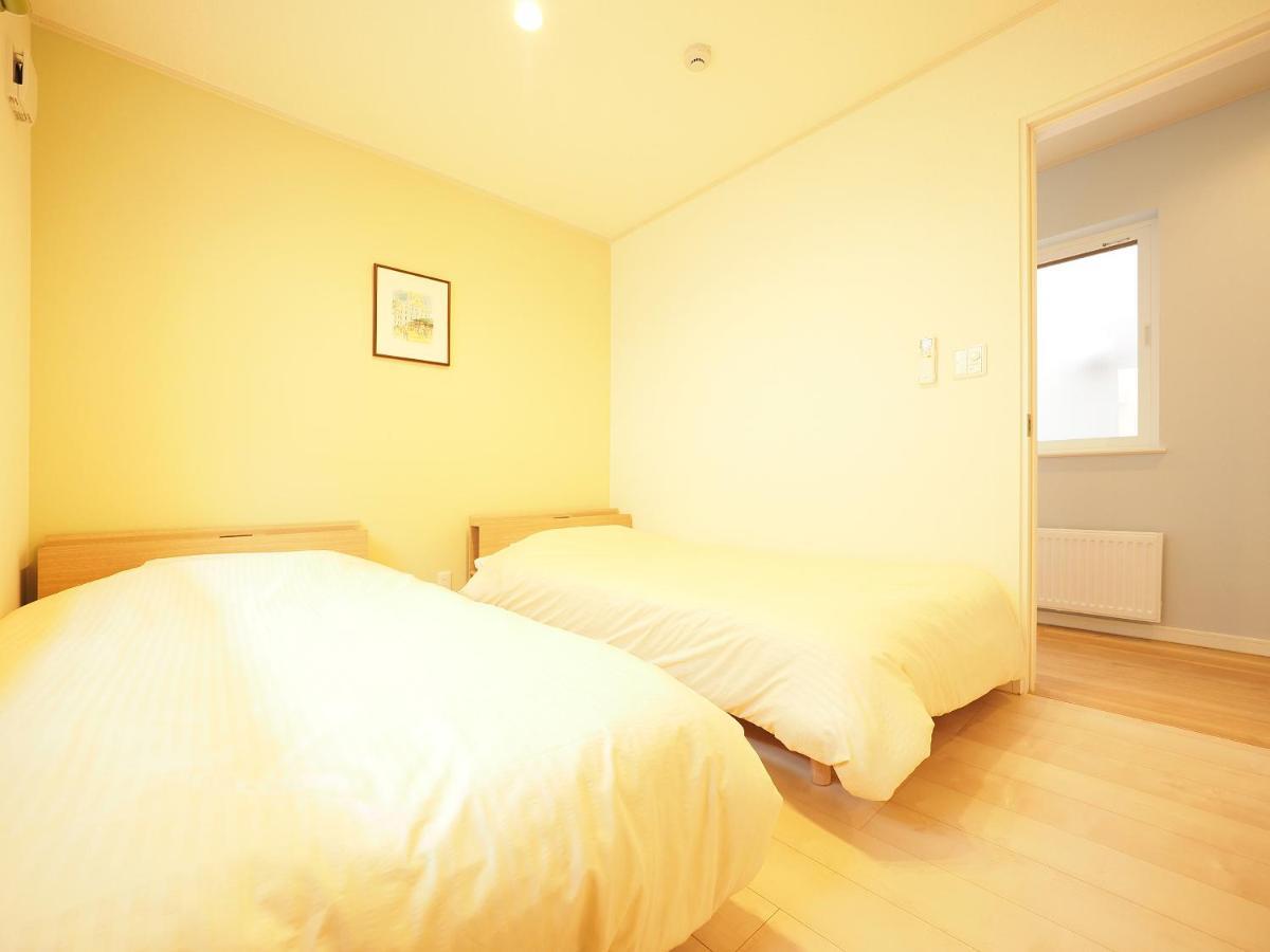 Family Tree Guest House Sapporo Esterno foto